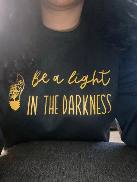 Be a Light in the Darkness Crewneck